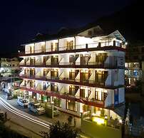 Goroomgo New Harmony Inn Manali