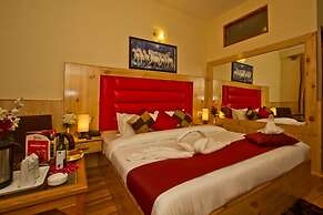 Goroomgo New Harmony Inn Manali