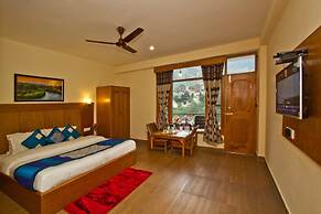 Goroomgo New Harmony Inn Manali