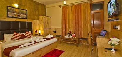 Goroomgo New Harmony Inn Manali