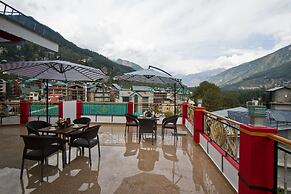 Goroomgo New Harmony Inn Manali
