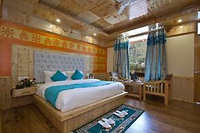 Goroomgo New Harmony Inn Manali