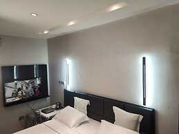 Triple Tee Luxury Hotel