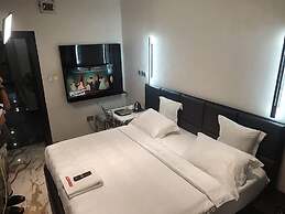 Triple Tee Luxury Hotel