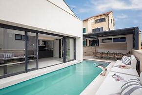 white residence with pool room