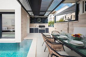 white residence with pool room