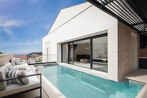 white residence with pool room
