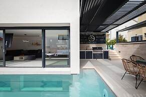 white residence with pool room