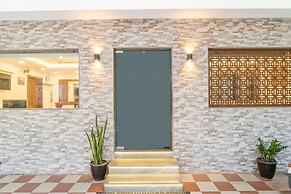 Fabhotel Vrj Residency