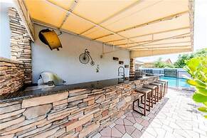 Luxe 4BR Waterfront w Htd Pool 5min to Beach