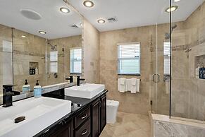 Luxe 4BR Waterfront w Htd Pool 5min to Beach