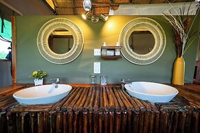 Chobe Mopani Forest Lodge & Camp site