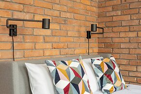 Kwiatowa Modern Studio Poznań by Renters