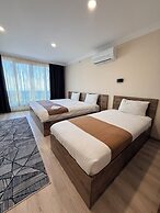 Rena Grand Residence & Suite