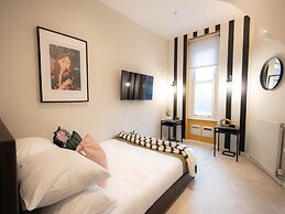 Explore Granary Square Two Bedroom by Belvilla