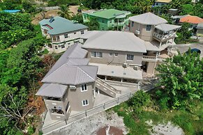 Your quaint home just steps from beach
