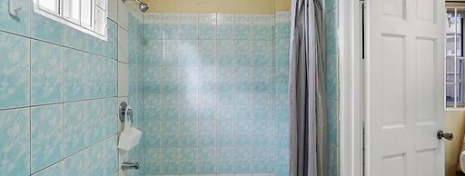 Your quaint home just steps from beach