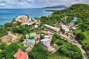 Your quaint home just steps from beach