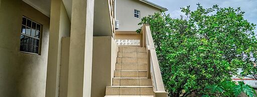 Your quaint home just steps from beach