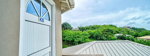 Your quaint home just steps from beach