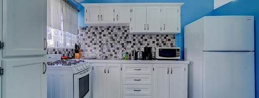 Your quaint home just steps from beach