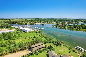 Riverfront Cheboygan Home w/ Dock ~ 4 Mi to Town!