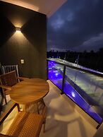 Flats Mana Beach Experience - Muro alto