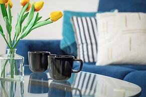 Wroclaw Dark Blue Apartment by Renters