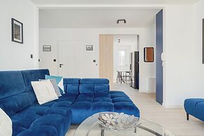 Wroclaw Dark Blue Apartment by Renters