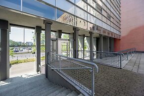 Wroclaw Dark Blue Apartment by Renters