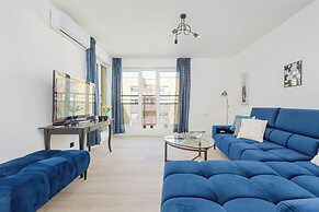 Wroclaw Dark Blue Apartment by Renters