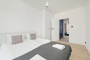 Wroclaw Dark Blue Apartment by Renters