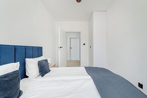 Wroclaw Dark Blue Apartment by Renters