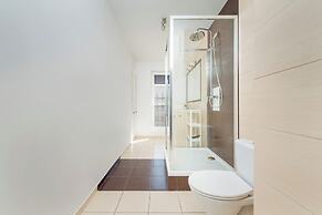 Wroclaw Dark Blue Apartment by Renters