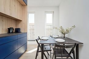 Wroclaw Dark Blue Apartment by Renters