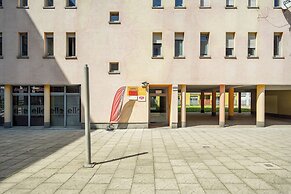 Wroclaw Dark Blue Apartment by Renters