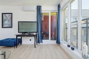 Wroclaw Dark Blue Apartment by Renters