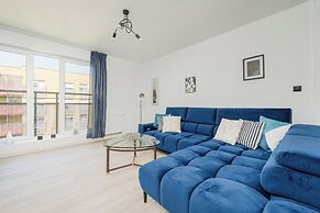 Wroclaw Dark Blue Apartment by Renters