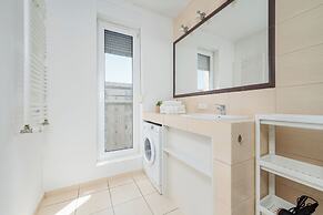 Wroclaw Dark Blue Apartment by Renters