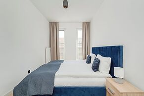 Wroclaw Dark Blue Apartment by Renters