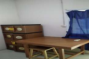 SPOT ON 93827 Rumah Kost Harapan Indah