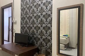 OYO 93918 Wisma Tulip Near Masjid Besar Desa Tanabangka