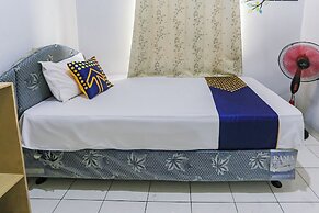 SPOT ON 93919 Murodi Syariah