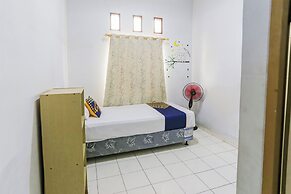 SPOT ON 93919 Murodi Syariah