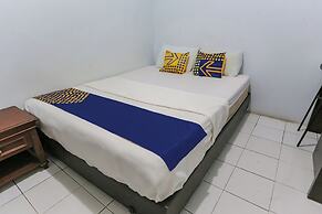 SPOT ON 93919 Murodi Syariah