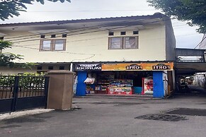 SPOT ON 93919 Murodi Syariah