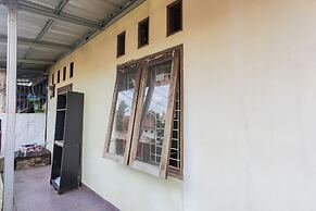 SPOT ON 93919 Murodi Syariah