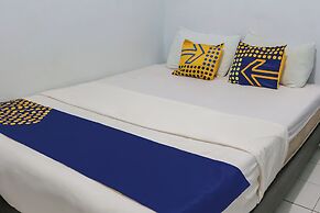 SPOT ON 93919 Murodi Syariah