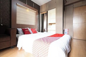 OYO 93945 The Suite Metro Apartemen By Sa