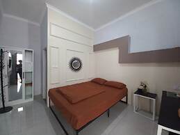 OYO 93962 Jm Guest House